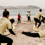 Base Surf Camp surf lesson on beach in Spain